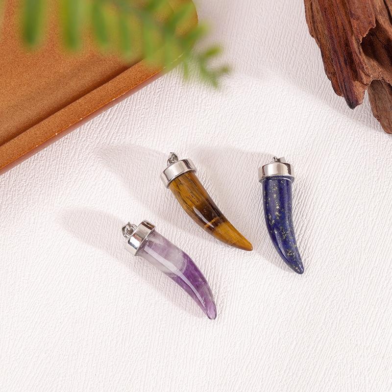 Natural Carved Crystal Wolf Tooth Pendant Natural Carved Crystal Wolf Tooth Pendant